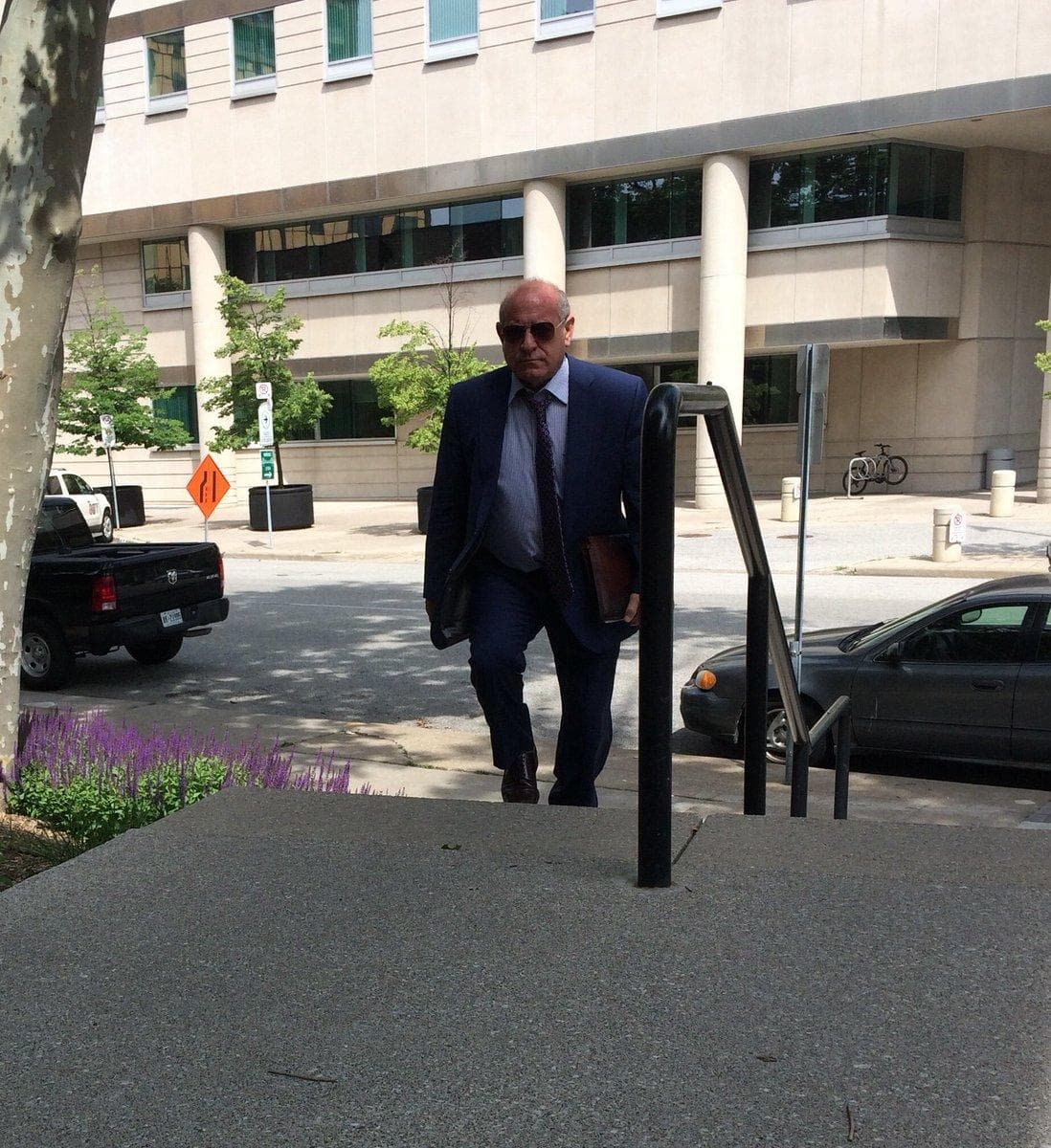 Paul Esco arriving at the courthouse